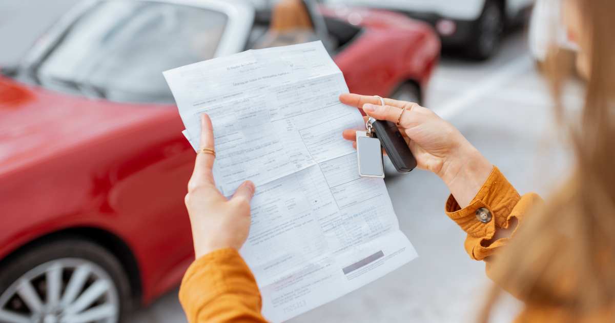 Woman with MVD paperwork for her registration loan in Arizona.